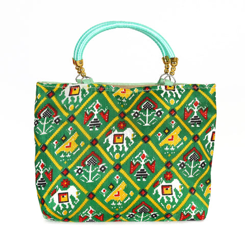 Unveil Tranquil Elegance: The Castleton Green Silk Handbag