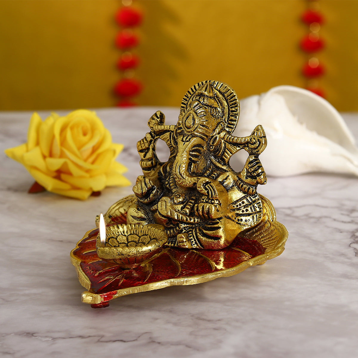 Lord Ganesha on Peepal Leaf Diya