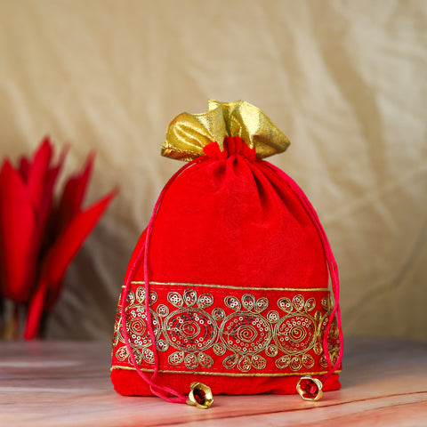 Unveiling Elegance: The Enchanting Rani Ruby Velvet Potli Bag