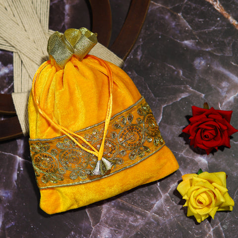 Elevate Your Elegance with the Golden Dynasty Velvet Potli Bag