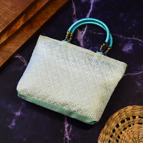 Elegance in Every Stitch: The Mint Green Chikankari Silk Handbag