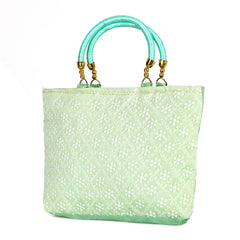Elegance in Every Stitch: The Mint Green Chikankari Silk Handbag