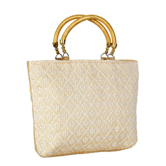 Elevate Elegance: The Brave Beige Chikankari Silk Handbag
